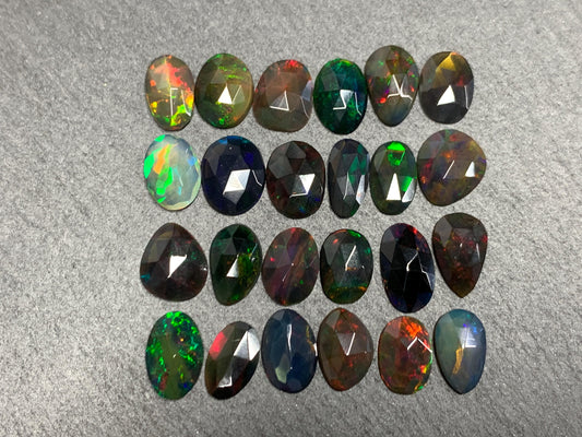 Faceted Black Ethiopian Opal 9-11mm long cabochon