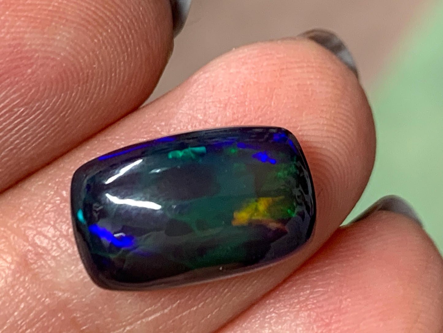 Natural Ethiopian Black Opal 9x14x5mm cabochon