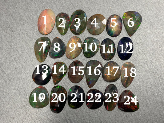 Faceted Black Ethiopian Opal 12-16mm long cabochon