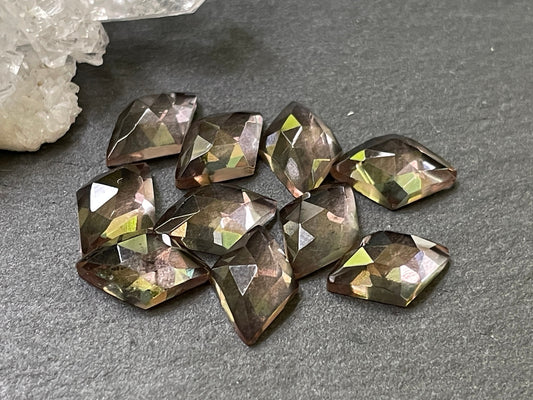 Faceted color changing Alexandrite rhombus 8x12mm cabochon