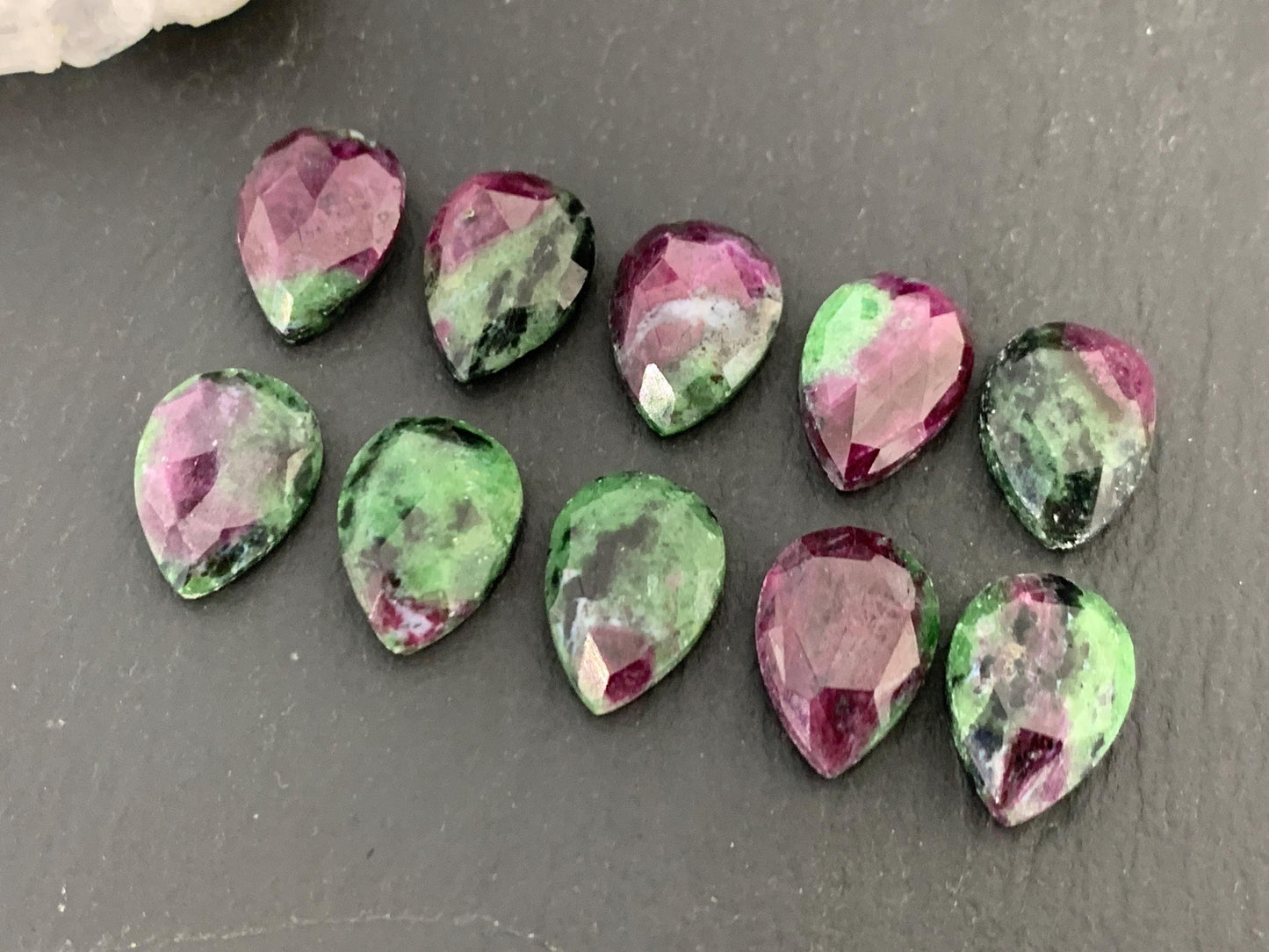Faceted Ruby Zoisite 10x14mm cabochon.
