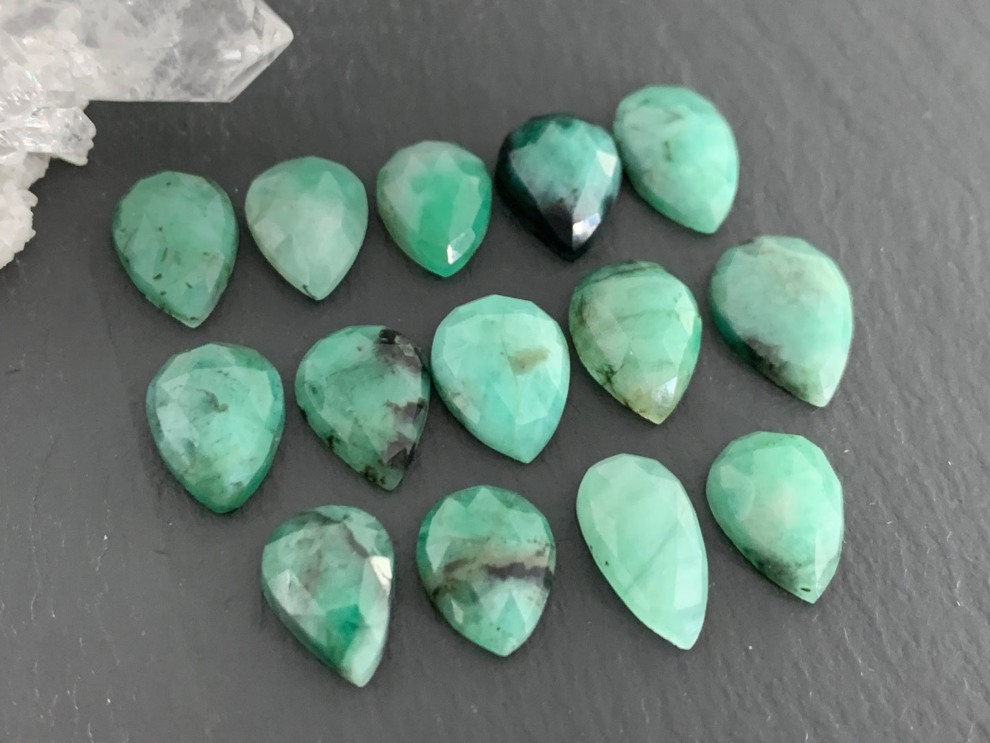 Faceted Emerald pear 11-13mm long cabochon