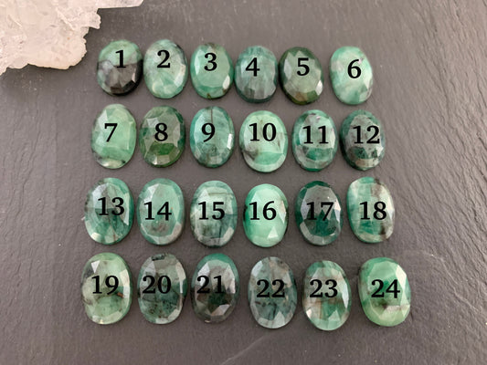 Faceted Emerald oval 10x14mm cabochon