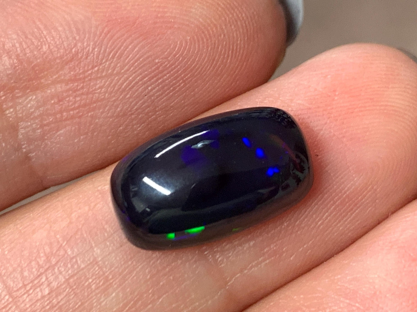 Natural Ethiopian Black Opal 8x14x5mm cabochon