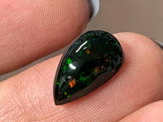 Natural Ethiopian Black Opal 8x14x6mm cabochon