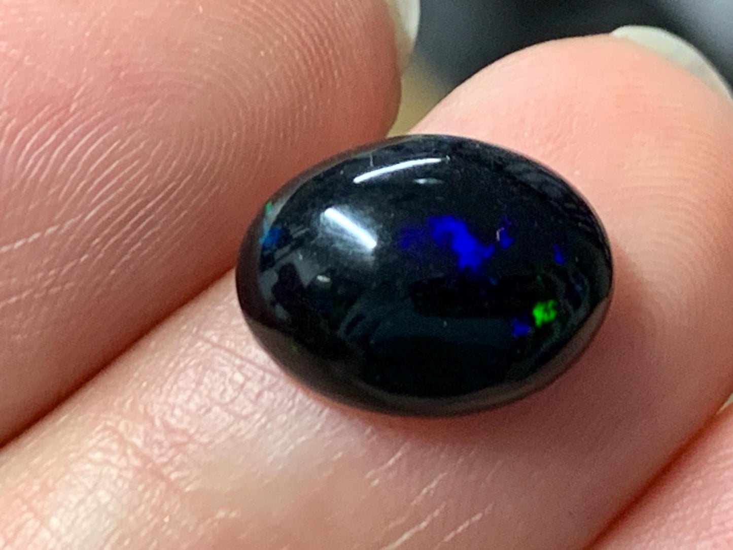 Natural Ethiopian Black Opal 9x12x5mm cabochon