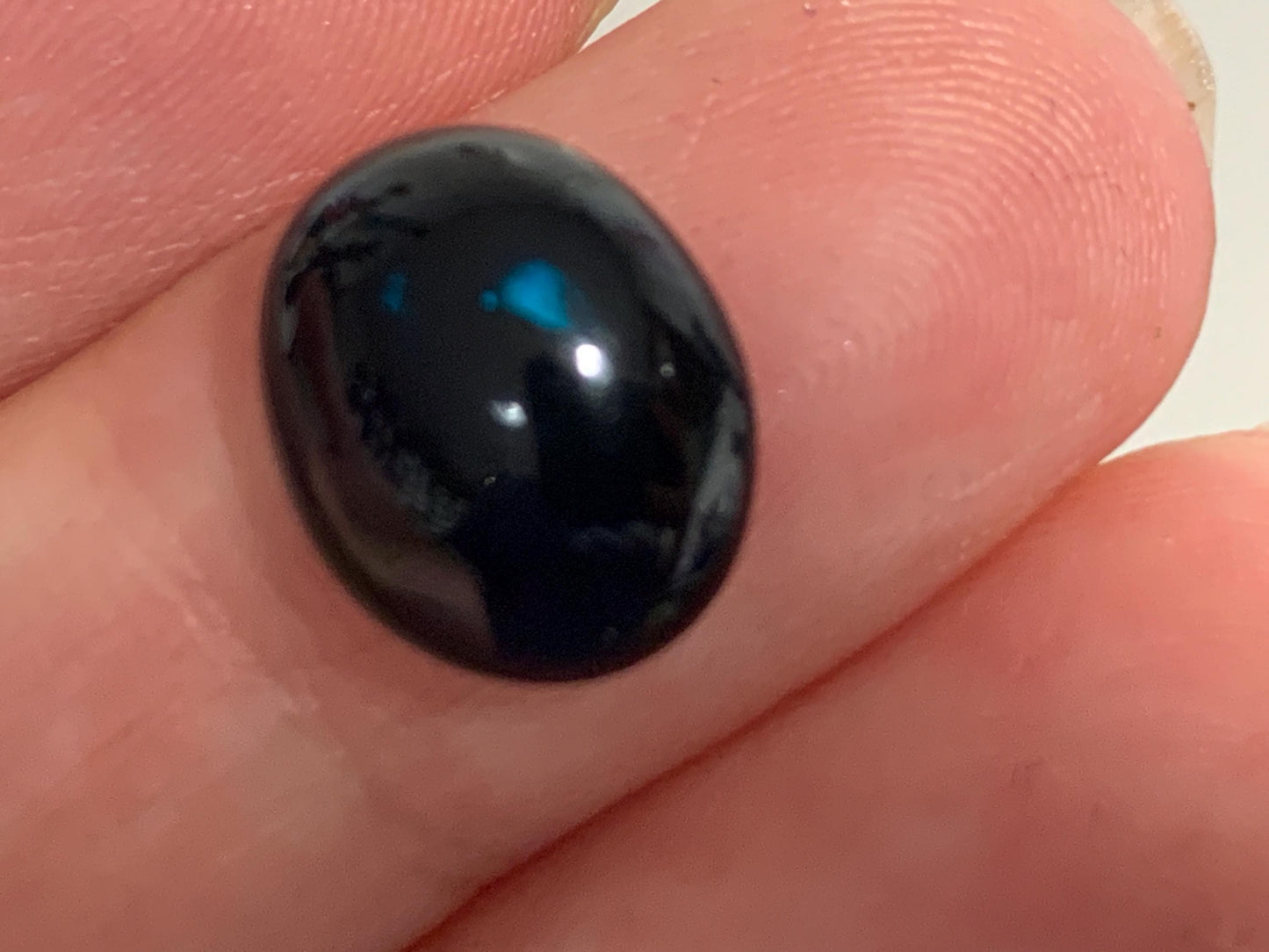 Natural Ethiopian Black Opal 10x12x5mm cabochon