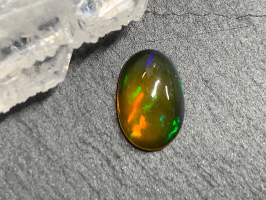 Natural Black Ethiopian Opal oval 6x10x4mm cabochon