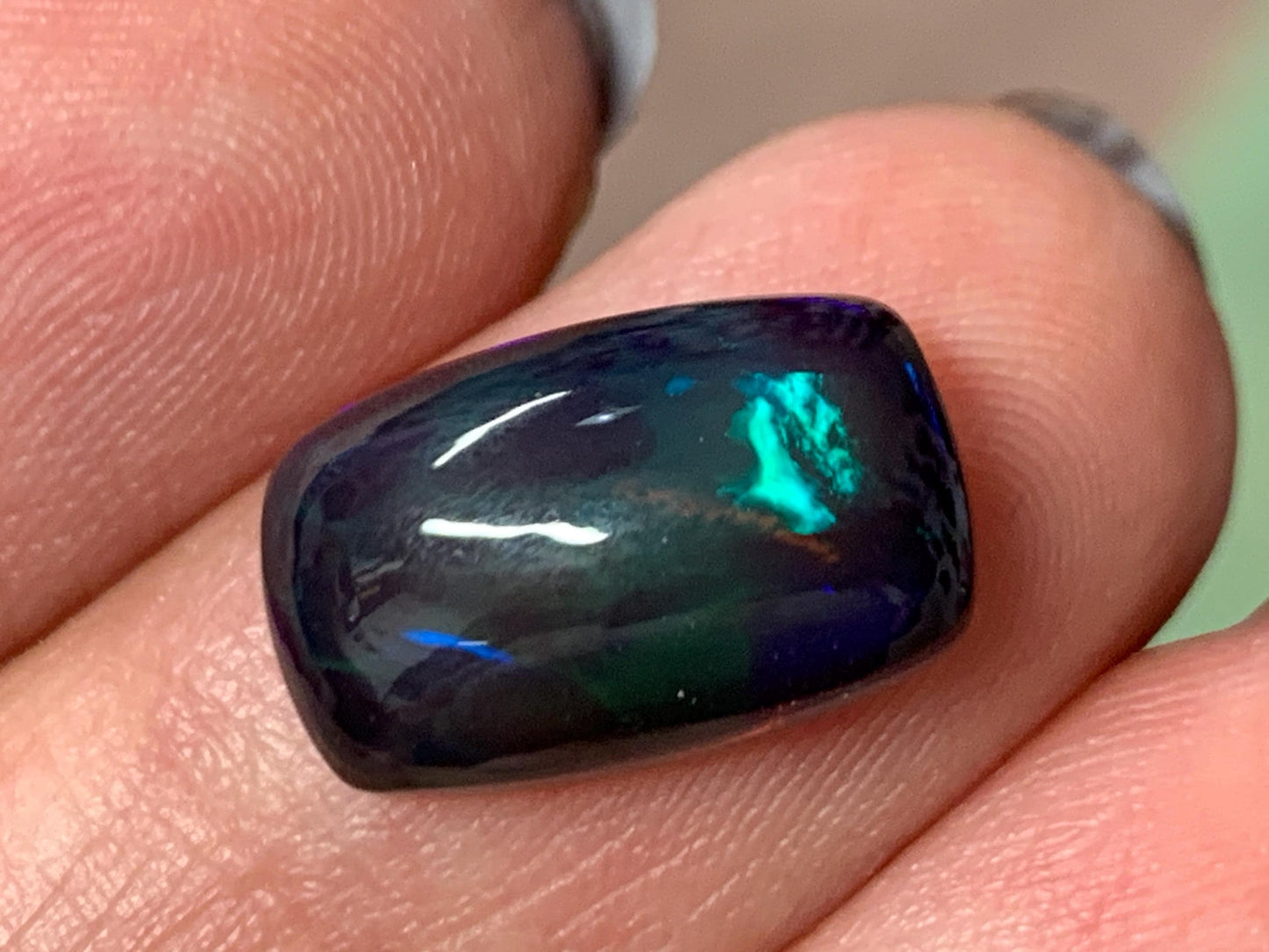 Natural Ethiopian Black Opal 9x14x5mm cabochon