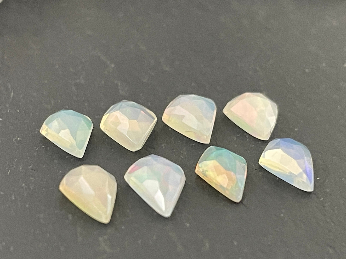 Faceted Ethiopian Opal kite 7.5-8.5mm long cabochon