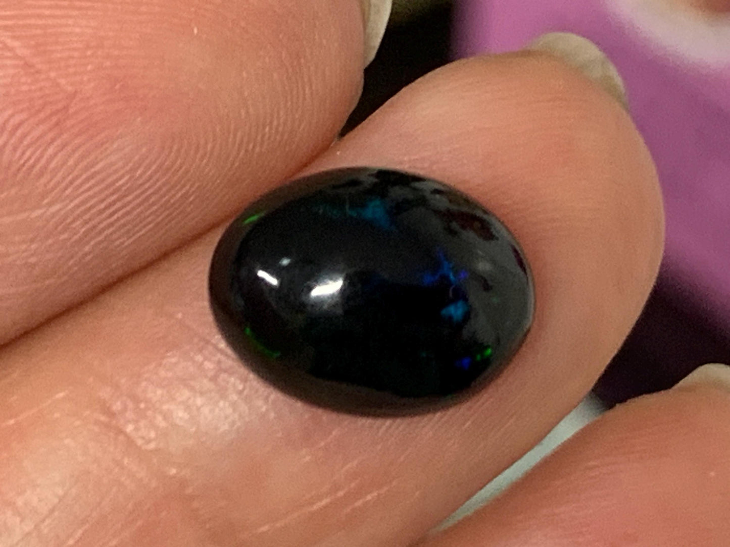 Natural Ethiopian Black Opal 9x12x5mm cabochon