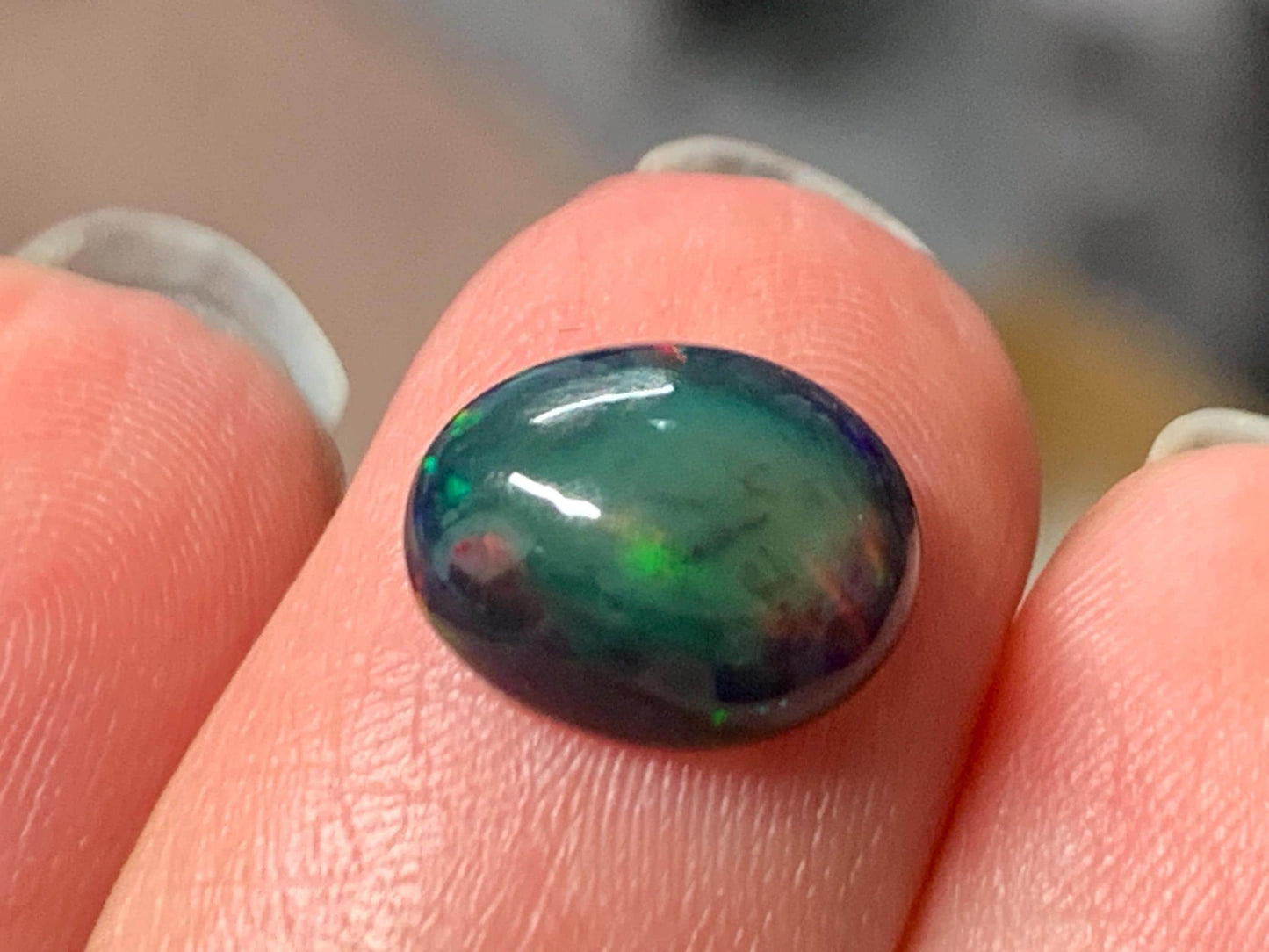 Natural Ethiopian Black Opal 8x10x4mm cabochon