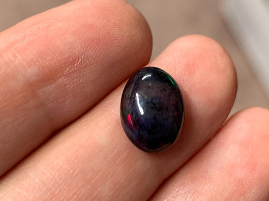 Black Ethiopian Opal oval 9x12x4mm cabochon