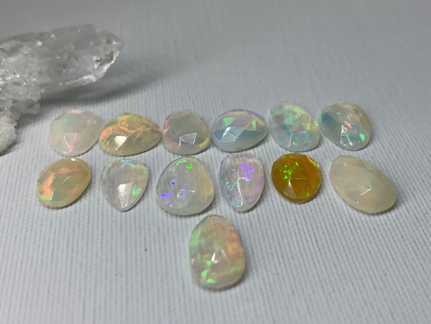 Faceted Ethiopian Opal 10-12mm long cabochon