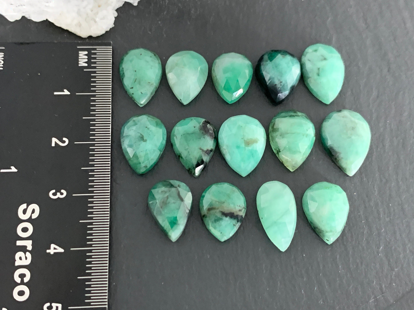 Faceted Emerald pear 11-13mm long cabochon