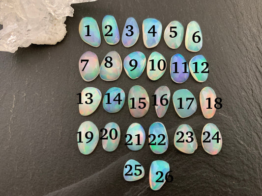 Faceted Ethiopian Opal 9-12mm long cabochon