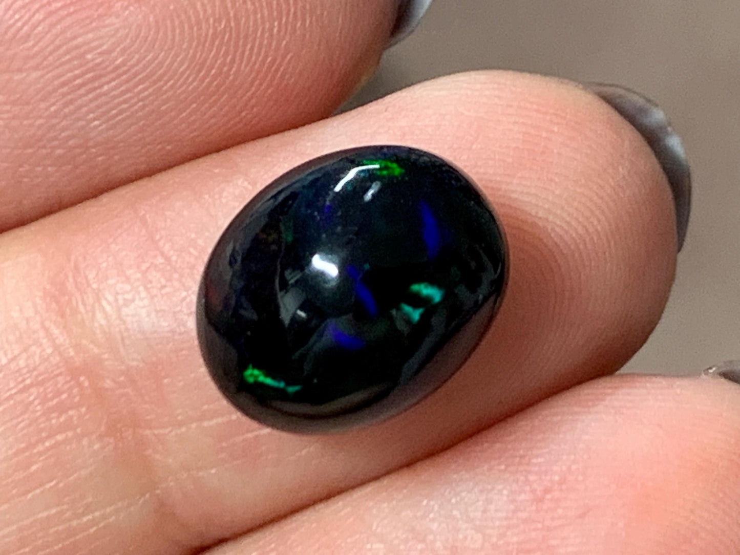 Natural Ethiopian Black Opal 10x12x5mm cabochon
