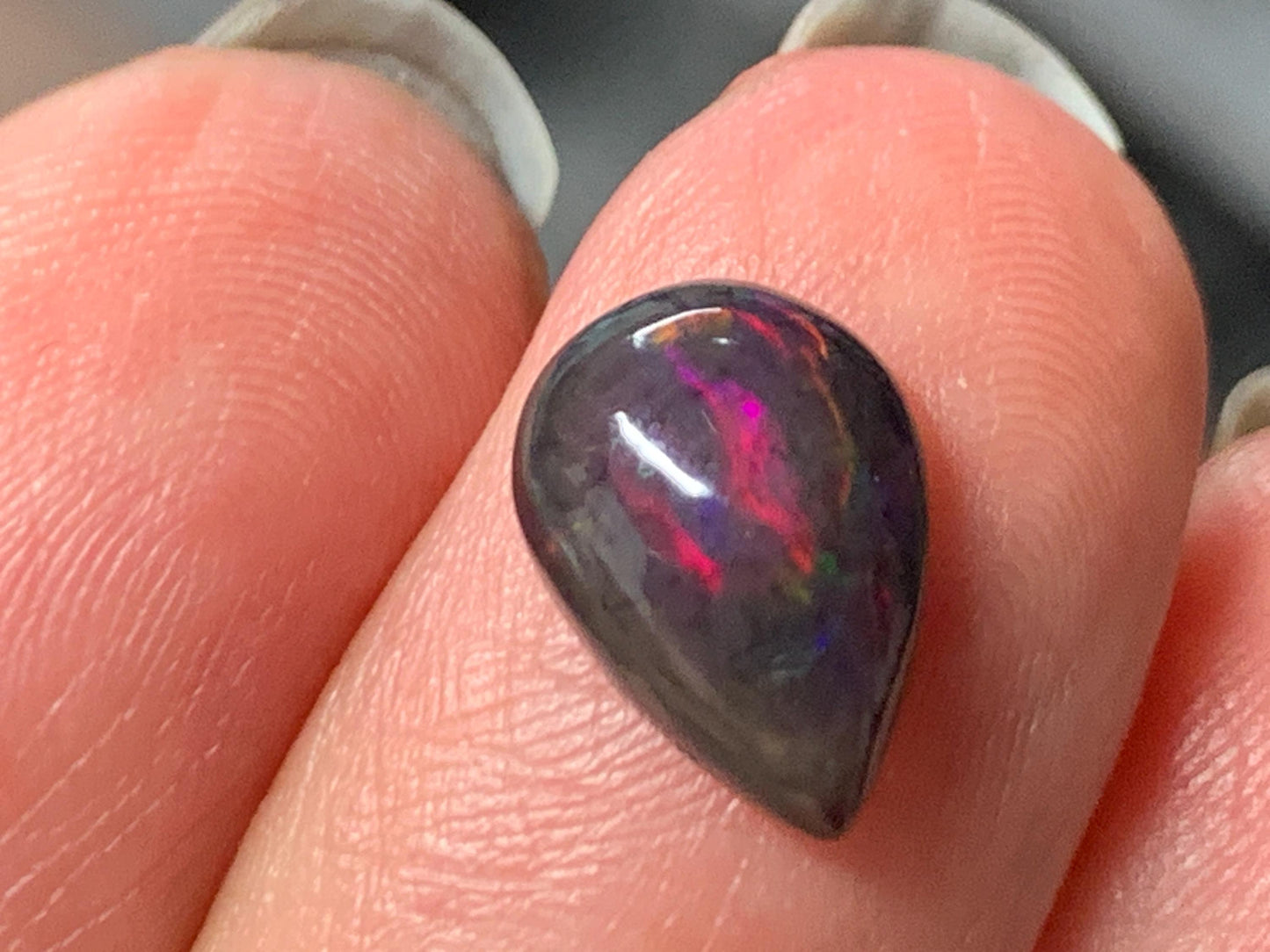 Natural Ethiopian Black Opal 7x11x4mm cabochon