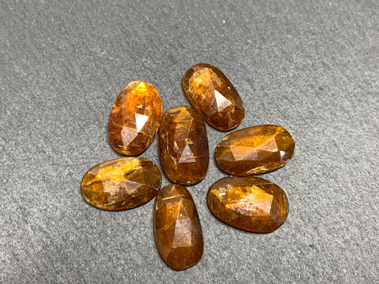 Damaged - faceted orange Kyanite oval 13mm long cabochons