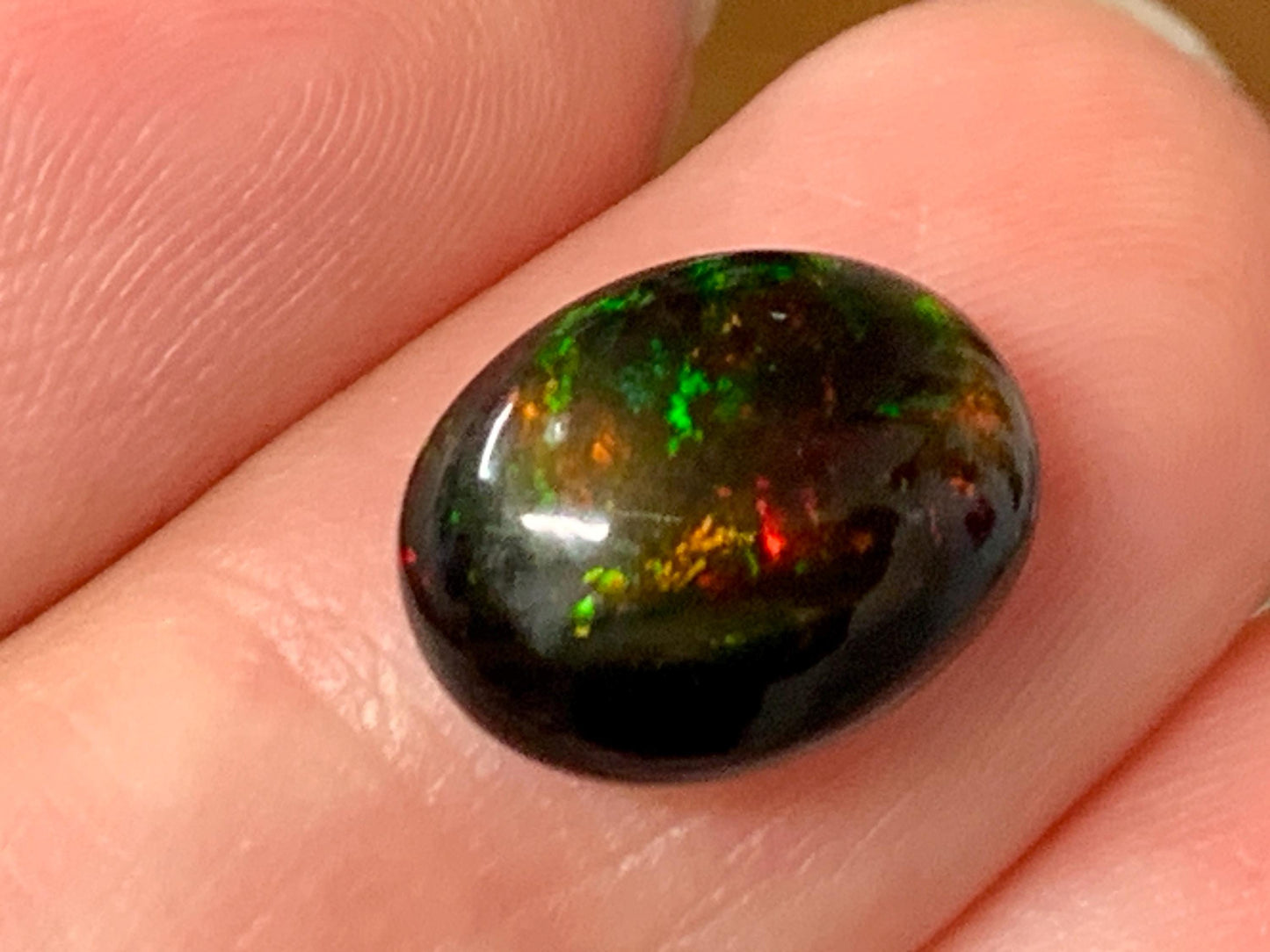 Natural Ethiopian Black Opal 9x12x5mm cabochon