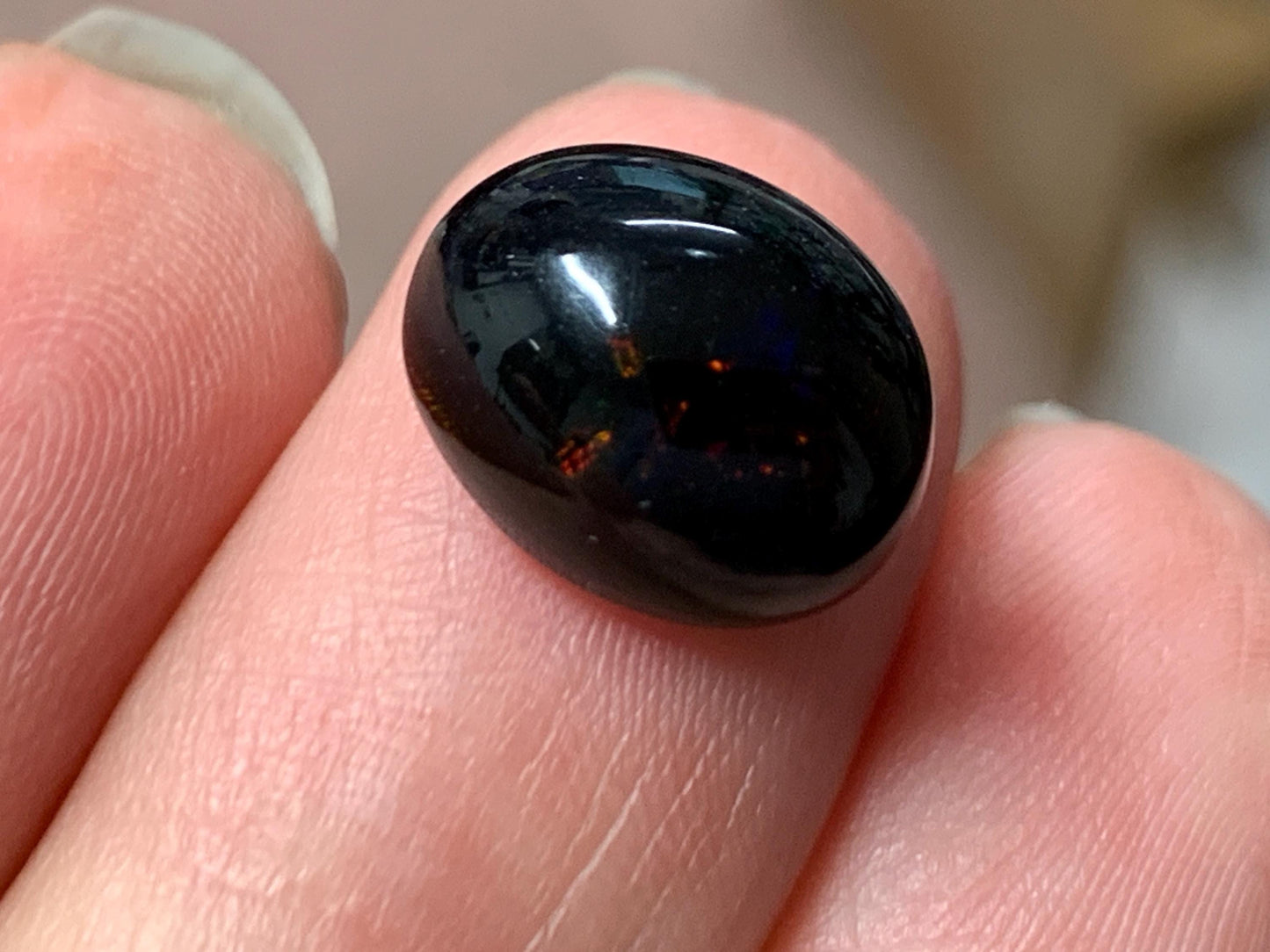 Natural Ethiopian Black Opal 9x12x7mm cabochon