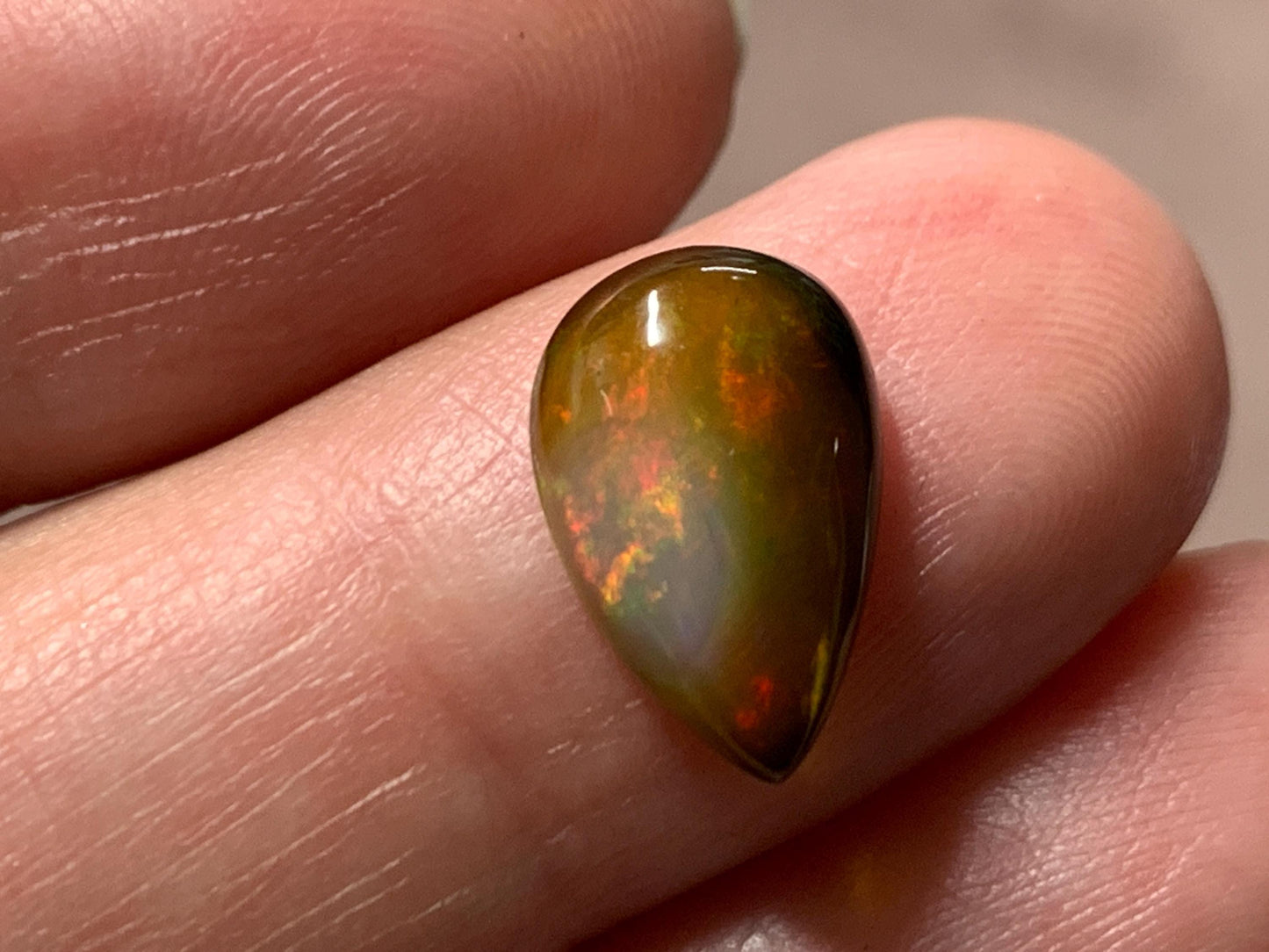 Natural Black Ethiopian Opal pear 8x13x4mm cabochon