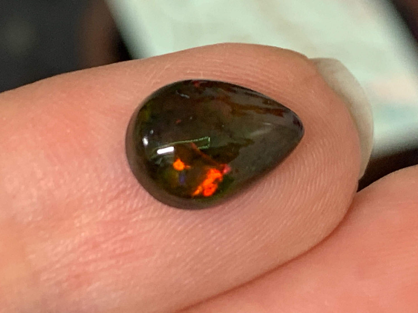 Natural Ethiopian Black Opal 7x11x3.5mm cabochon