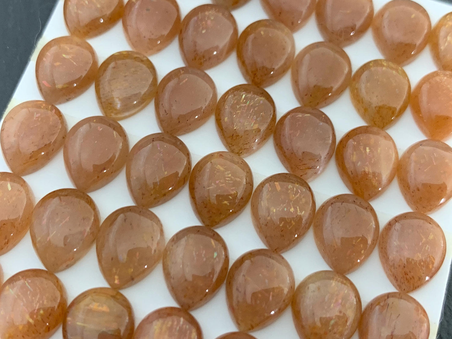 Gold Sunstone pear 8x10mm cabochon