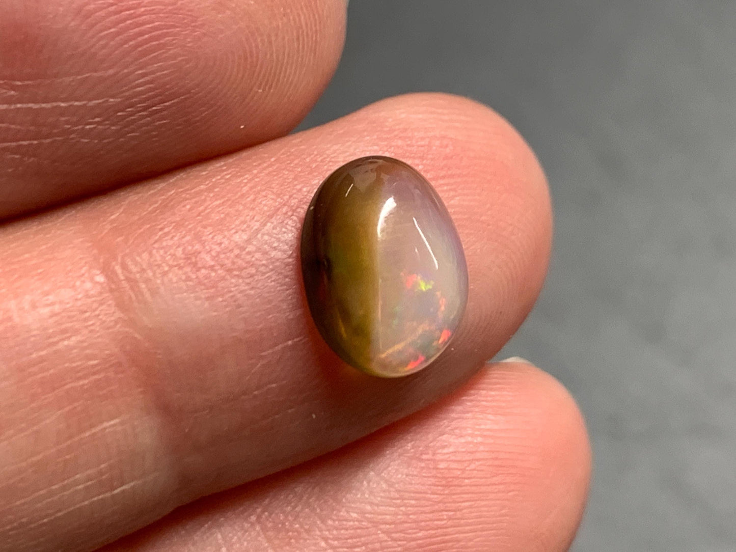 Natural Black Ethiopian Opal oval 7x10x4mm cabochon