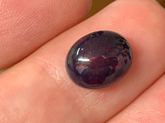 Natural Ethiopian Black Opal 8x10x5mm cabochon
