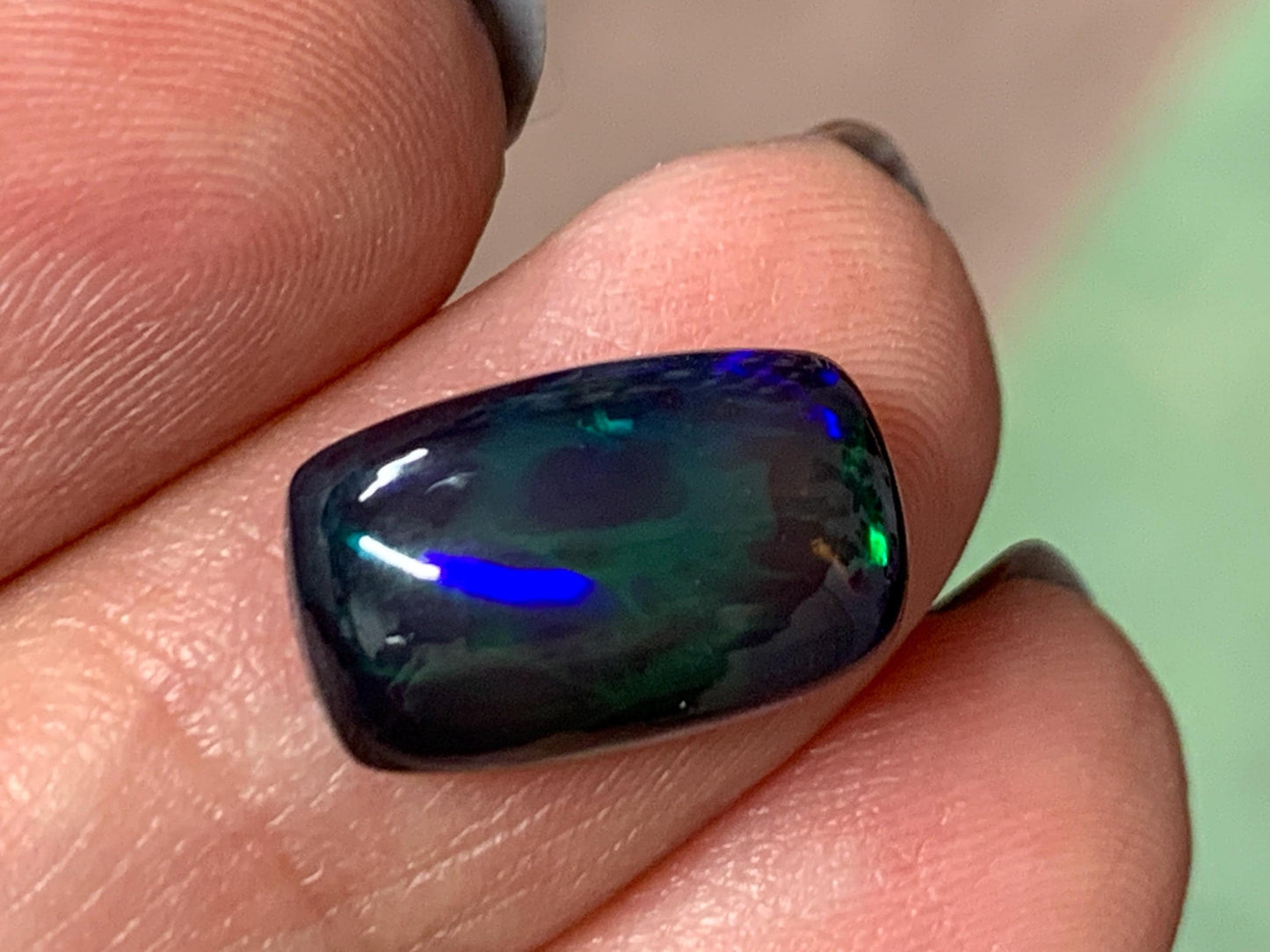 Natural Ethiopian Black Opal 9x14x5mm cabochon