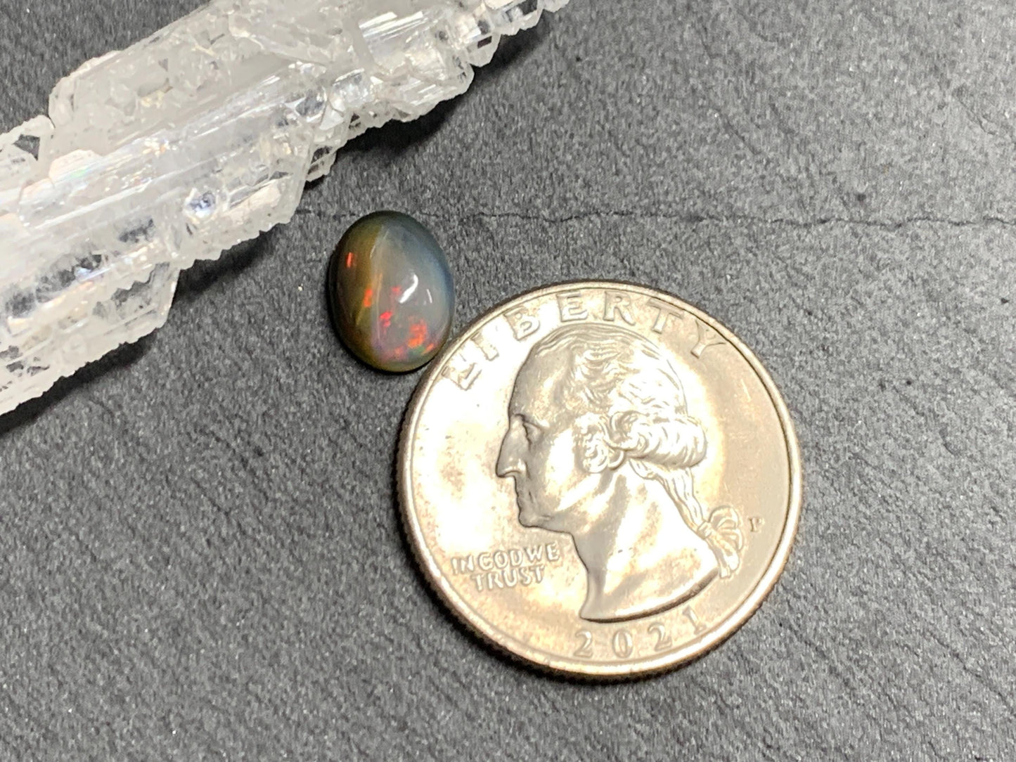Natural Black Ethiopian Opal oval 7x10x4mm cabochon