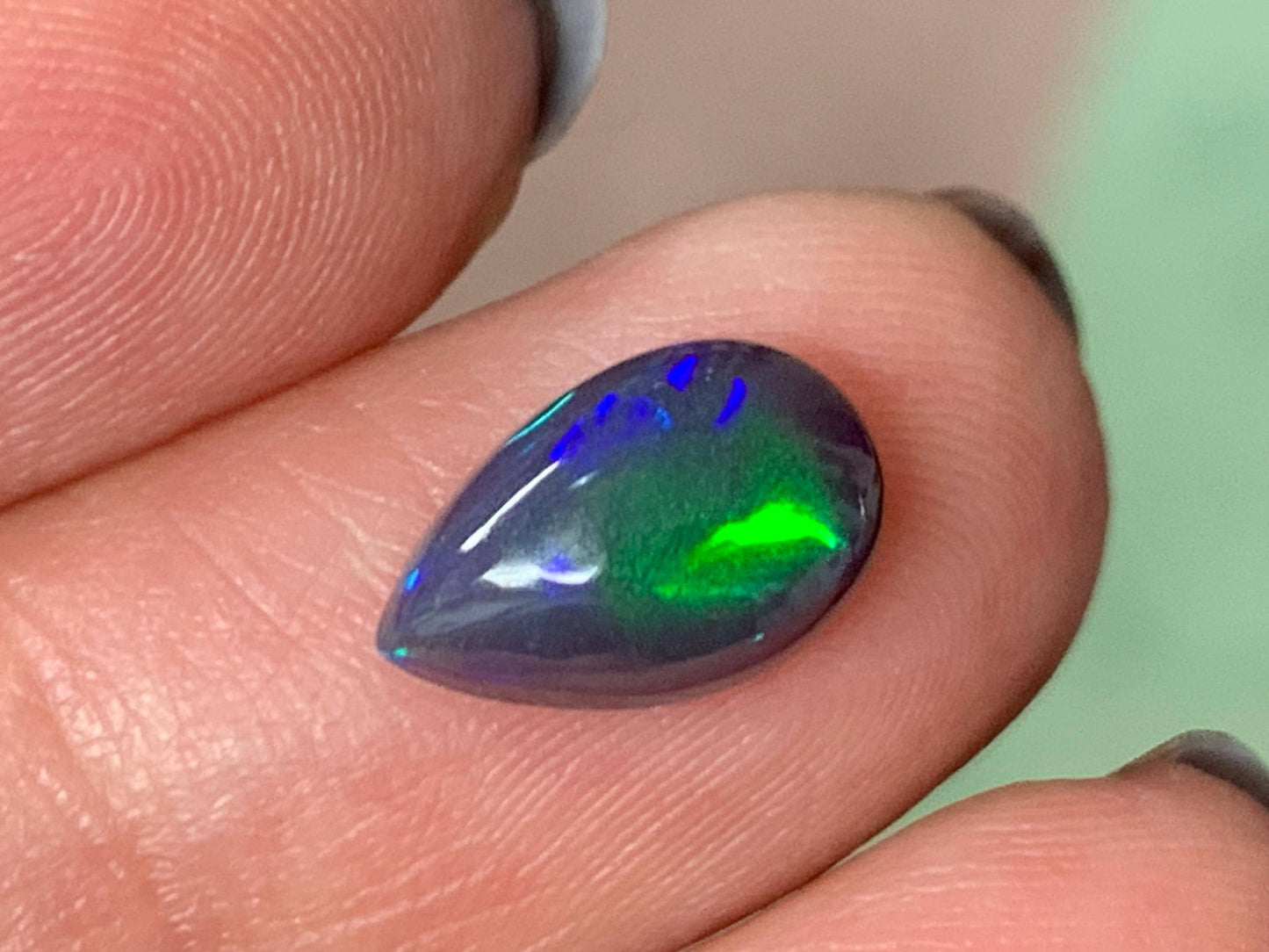 Natural Ethiopian Black Opal 7x11x4mm cabochon