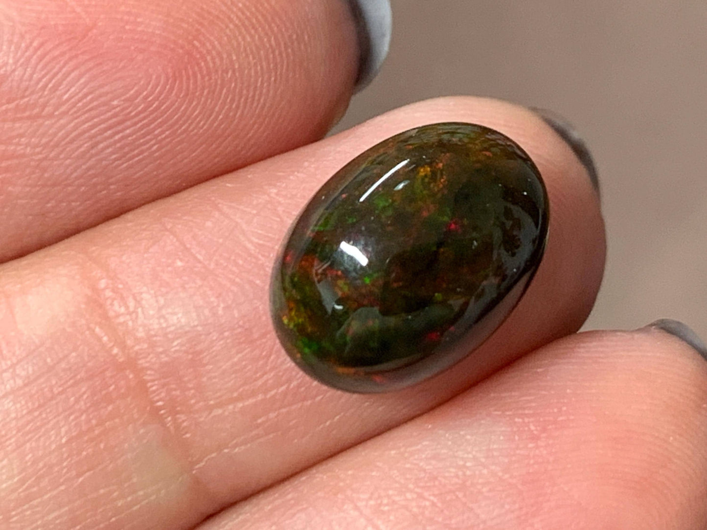 Natural Ethiopian Black Opal 10x14x6mm cabochon