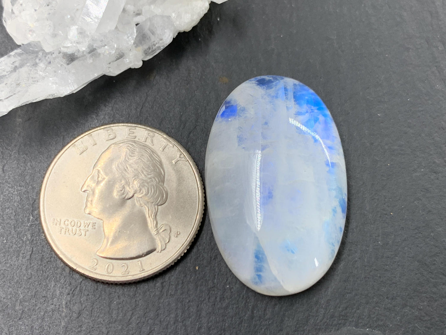 Rainbow Moonstone oval 33x21x9mm cabochon