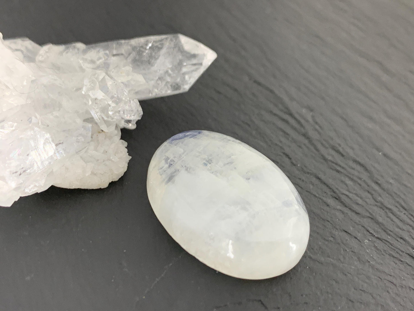 Rainbow Moonstone oval 26x19x7mm cabochon