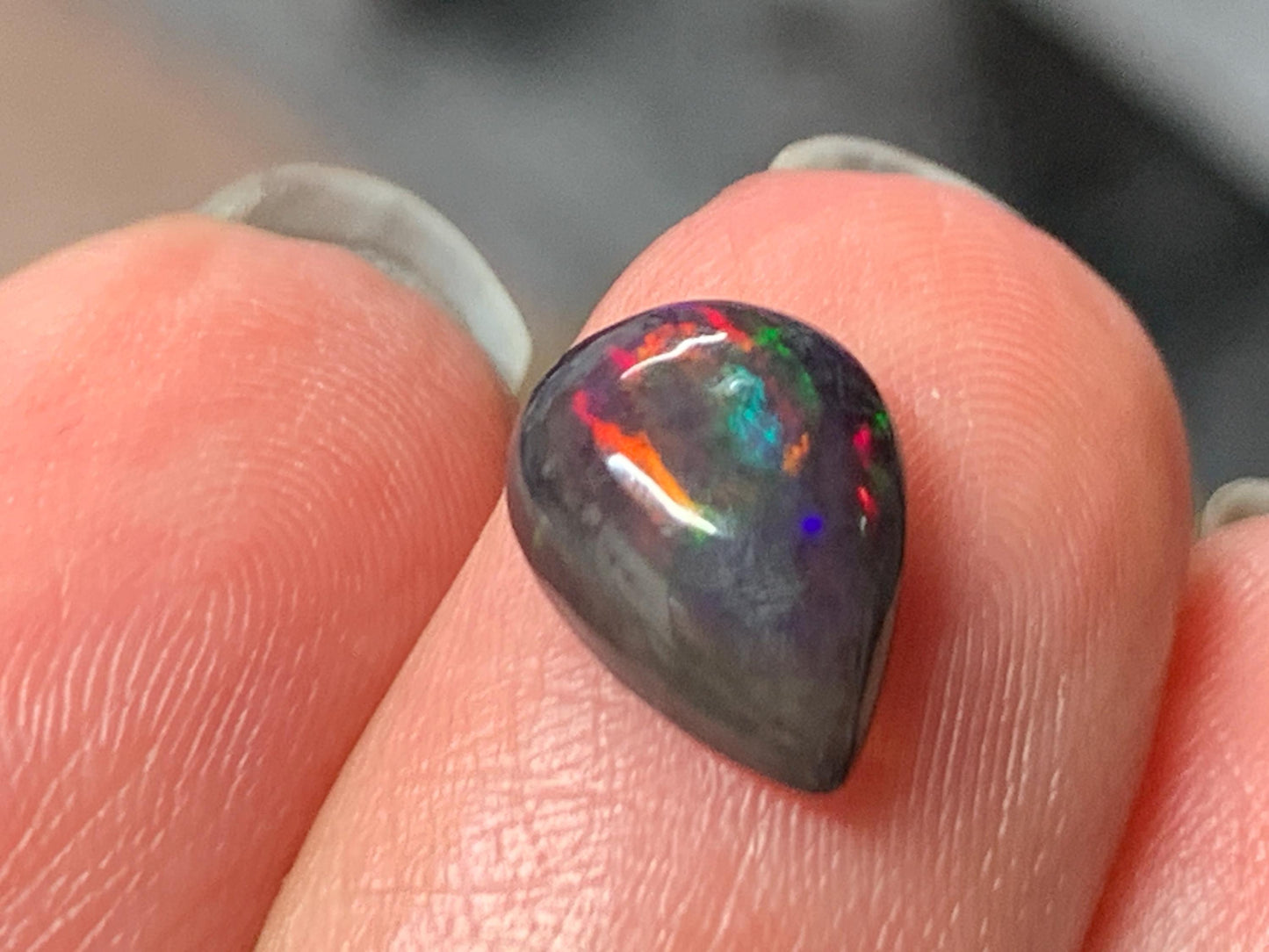 Natural Ethiopian Black Opal 7x11x4mm cabochon