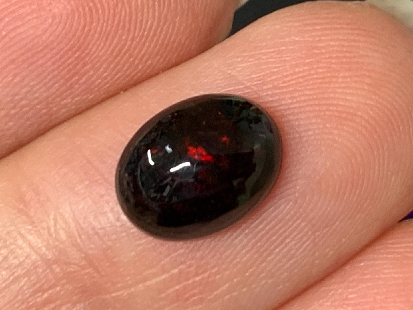 Natural Ethiopian Black Opal 7x9x4mm cabochon
