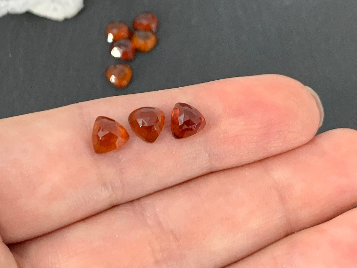 Faceted Hessonite Garnet trillion 6mm cabochon