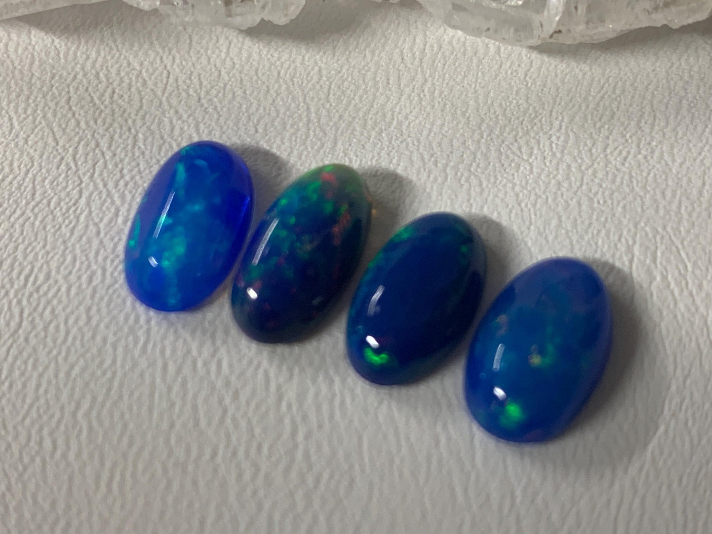 Ethiopian Opal oval 11-12mm long cabochon - Natural Opal smoked to blue color