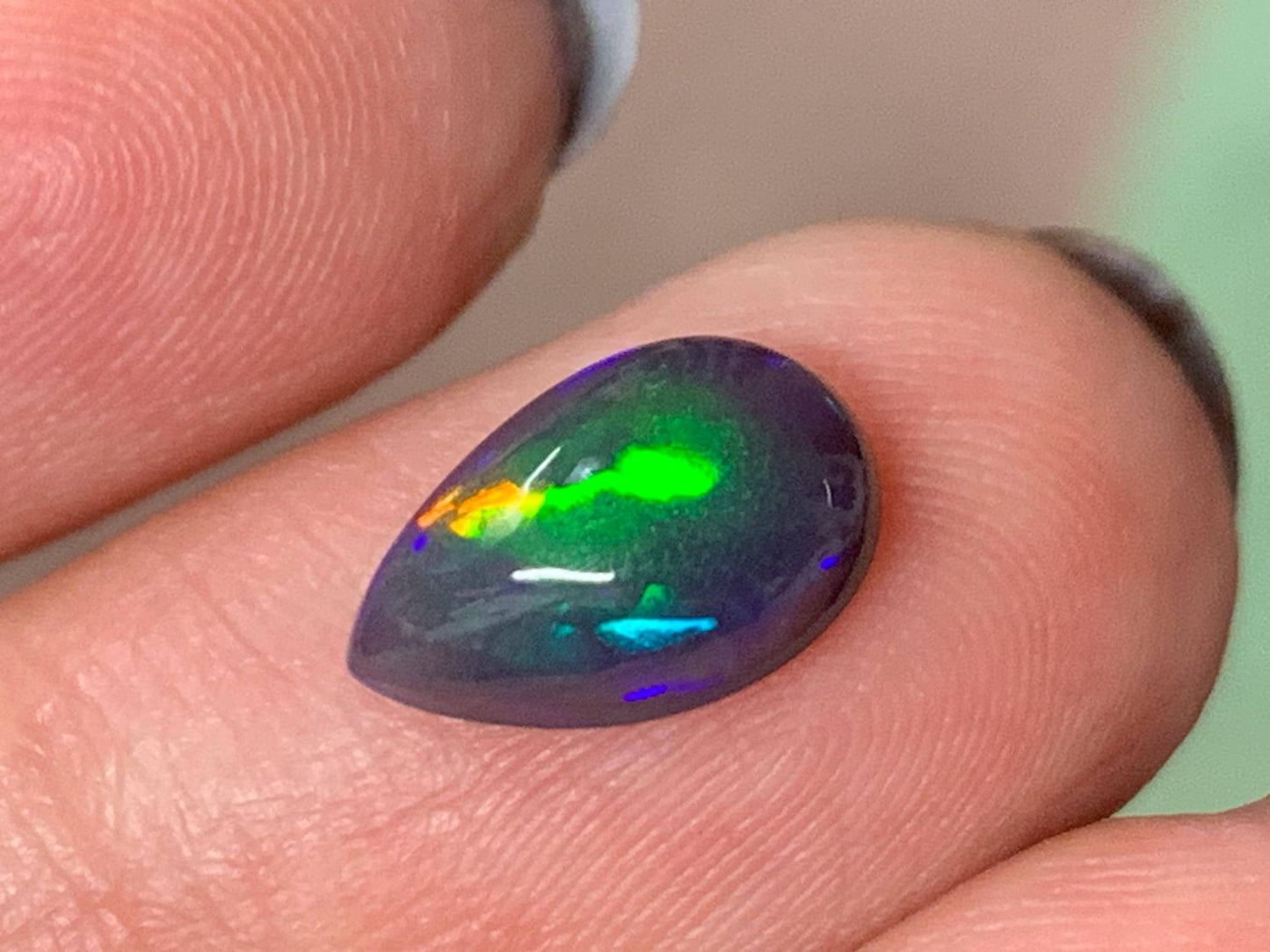 Natural Ethiopian Black Opal 7x11x4mm cabochon