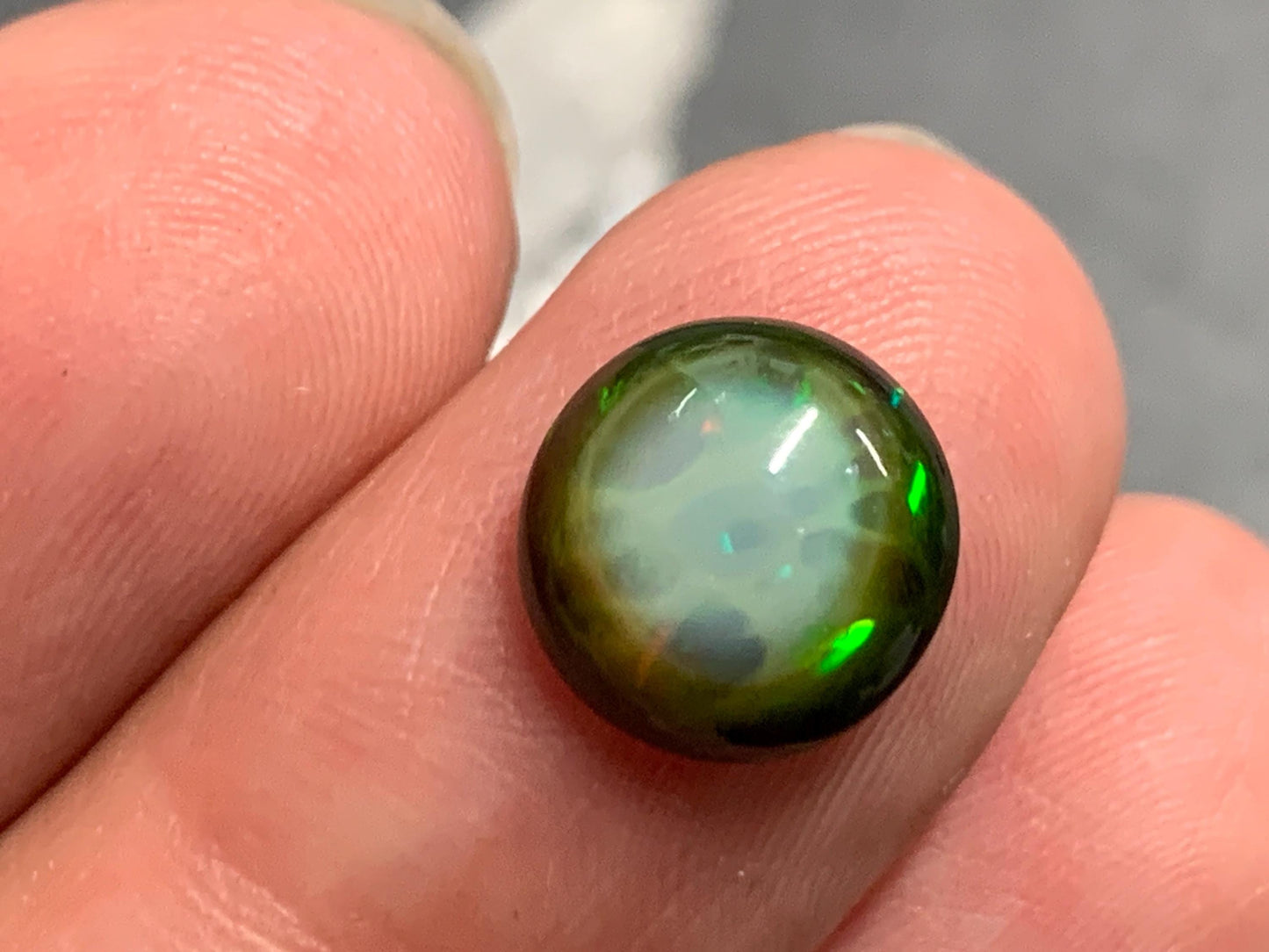 Natural Black Ethiopian Opal round 9.5x9.5x4mm cabochon