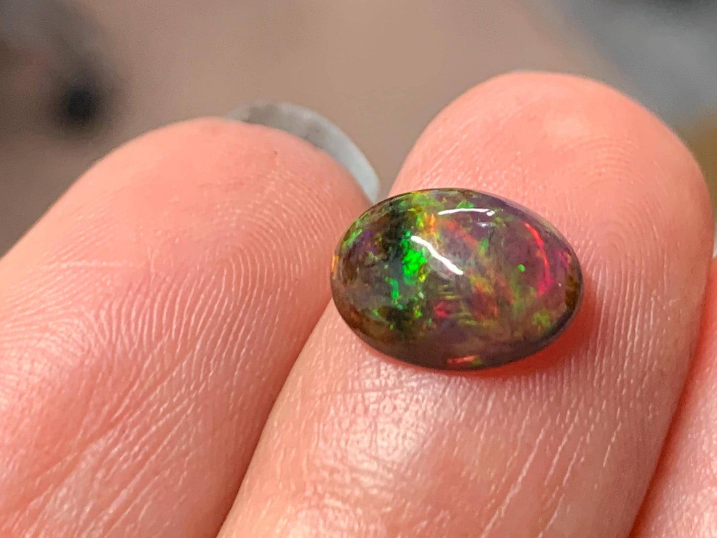 Natural Ethiopian Black Opal 7x10x3mm cabochon