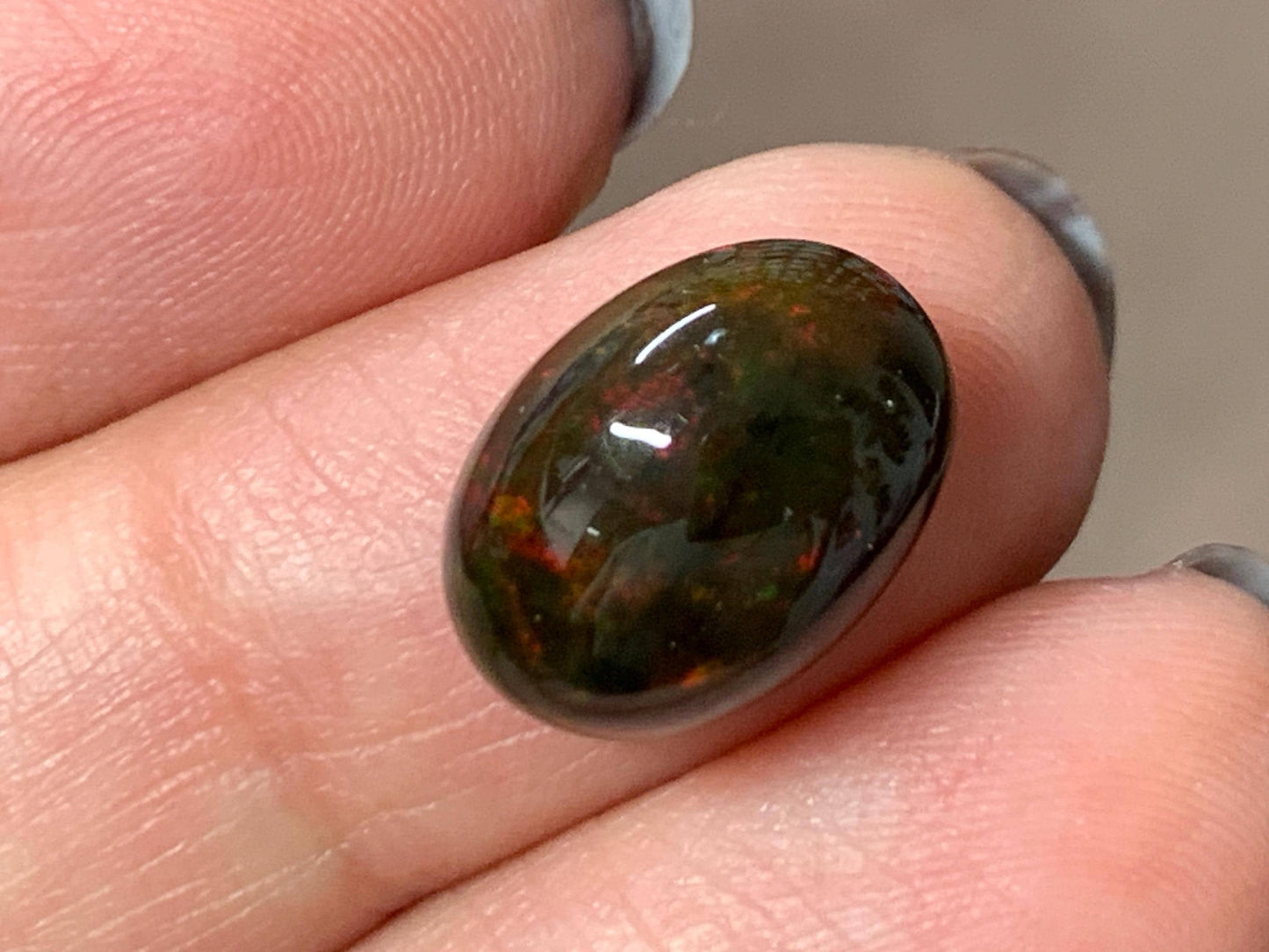 Natural Ethiopian Black Opal 10x14x6mm cabochon