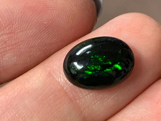 Natural Ethiopian Black Opal 9x12x4mm cabochon