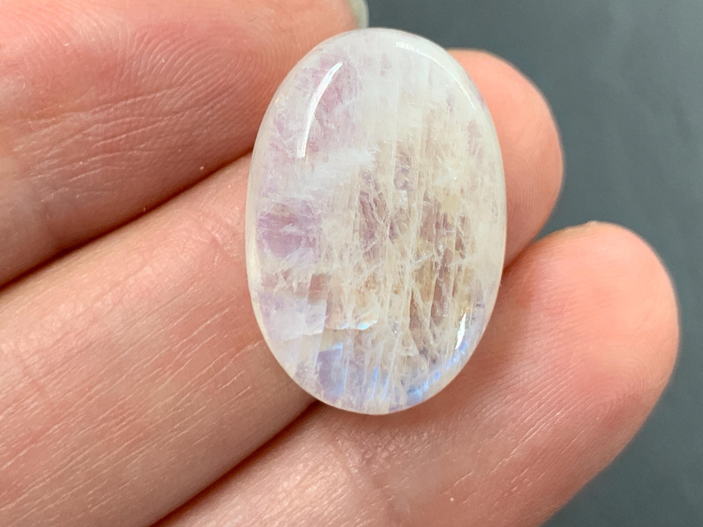 Rainbow Moonstone oval 22x15x6mm cabochon