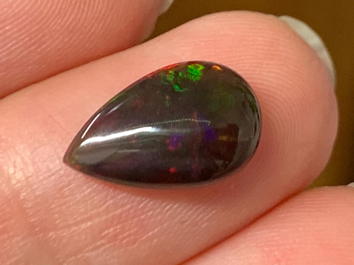 Natural Ethiopian Black Opal 8x13x4mm cabochon
