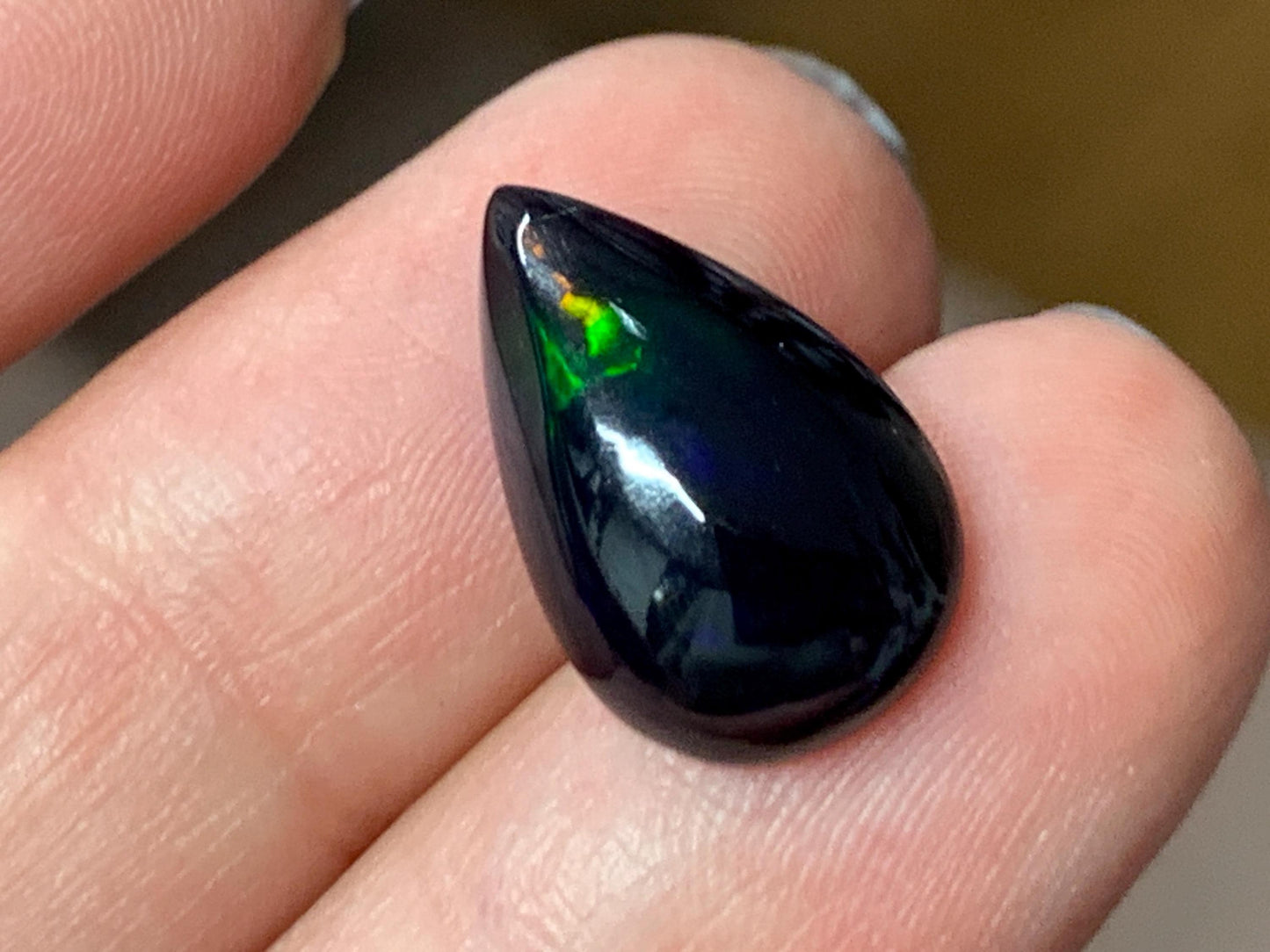Natural Ethiopian Black Opal 10x16x5mm cabochon
