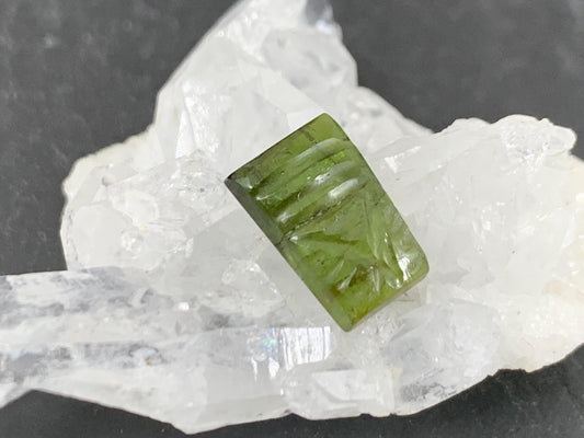 Carved Tourmaline 7x10x3mm cabochon