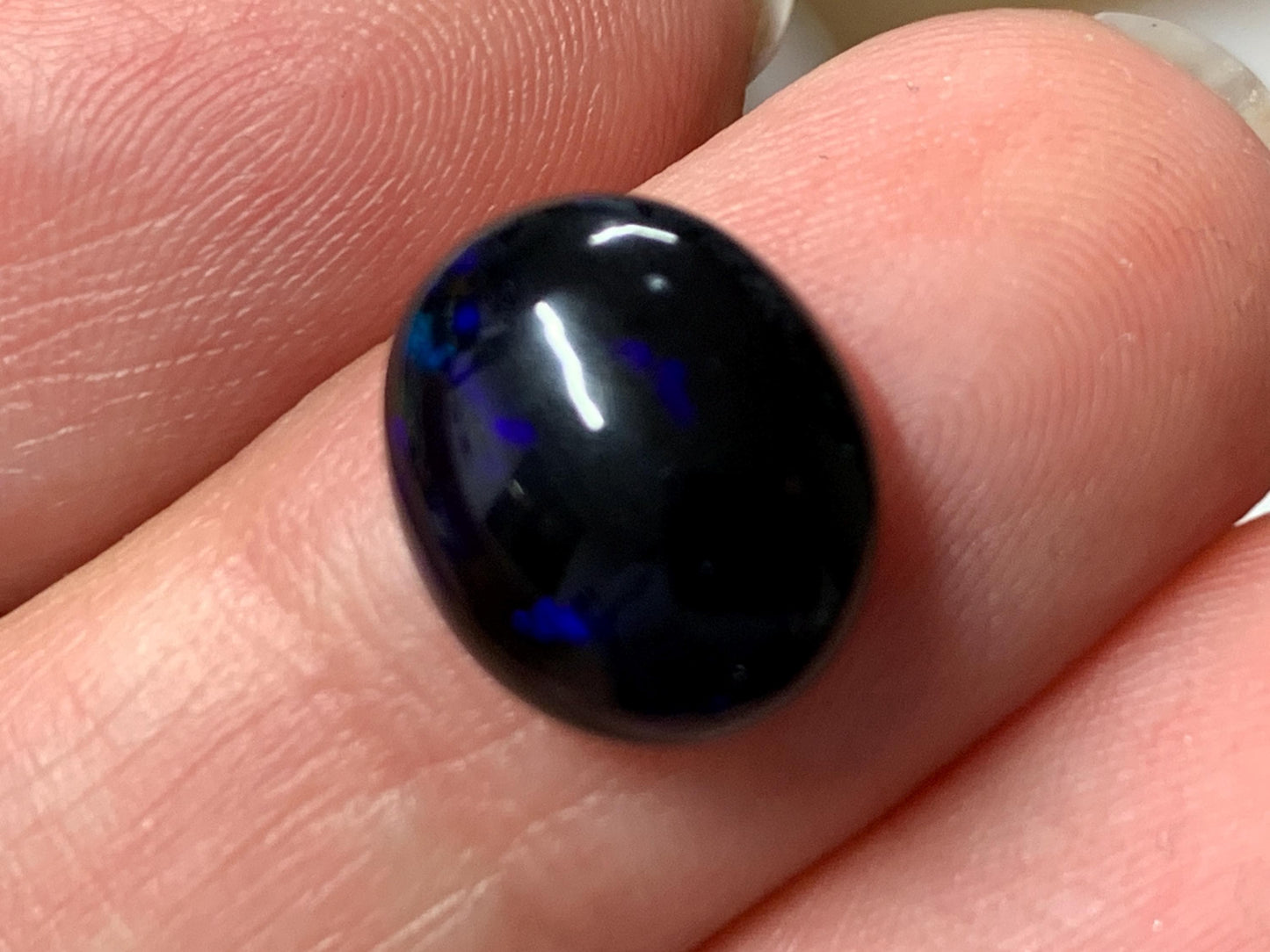 Natural Ethiopian Black Opal 10x12x5mm cabochon